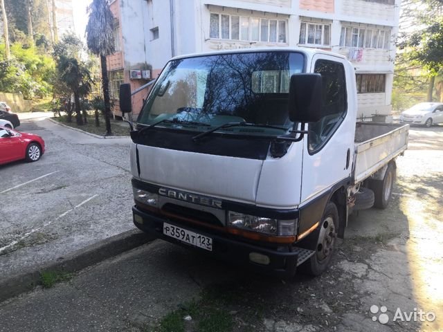 Бортовой автомобиль Mitsubishi Canter