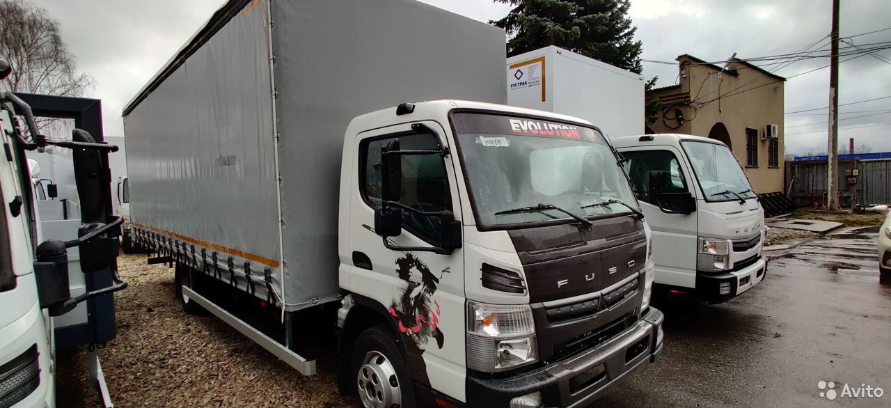 Тентованный автомобиль Mitsubishi Fuso Canter