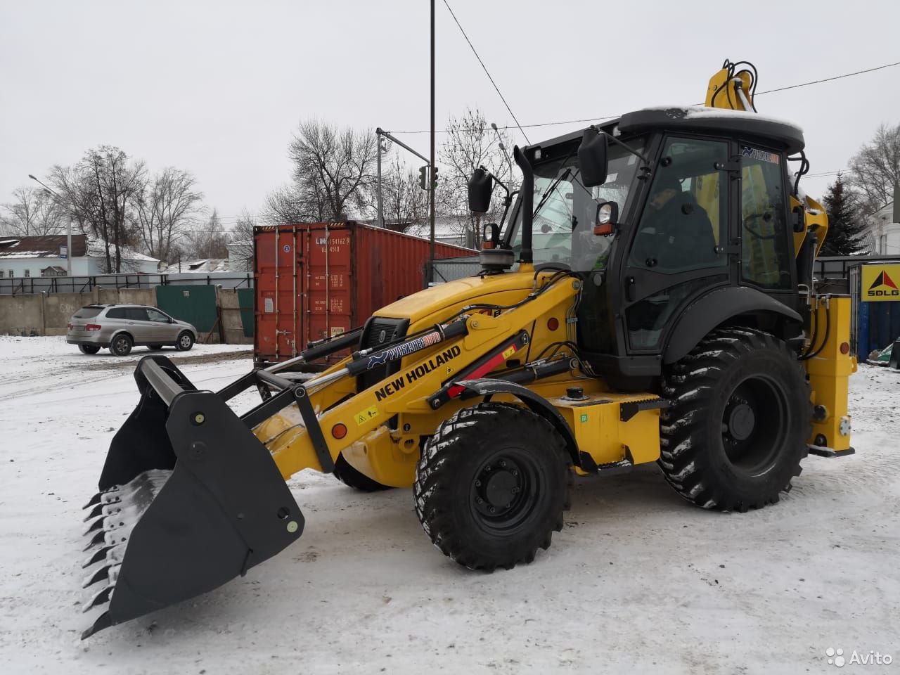 Экскаватор-погрузчик New Holland B80B