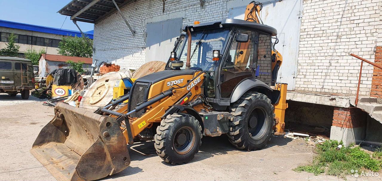 Экскаватор-погрузчик Case 570ST
