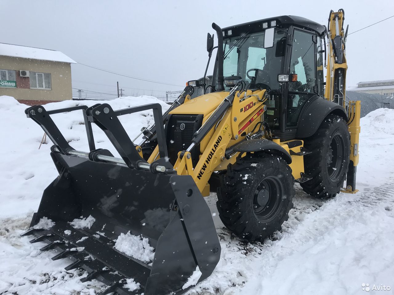 Экскаватор-погрузчик New Holland B100B