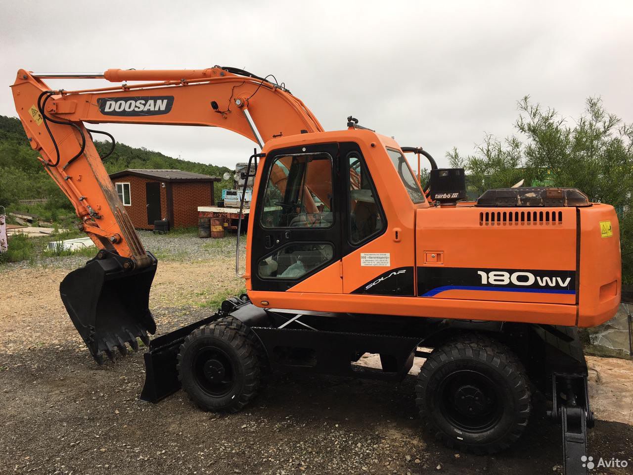 Колесный экскаватор Doosan 180