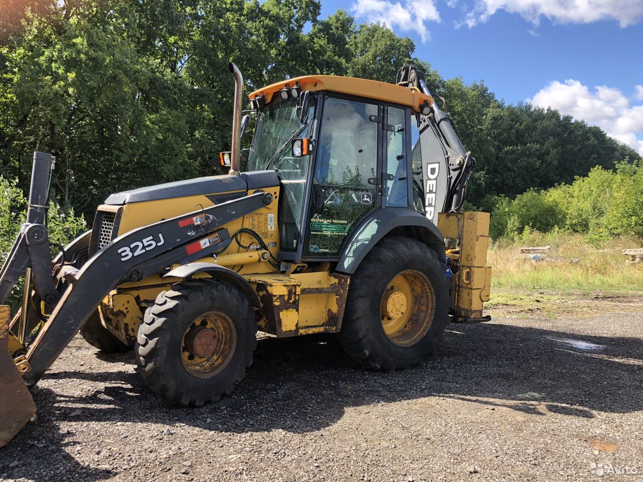 Экскаватор-погрузчик John Deere 325J