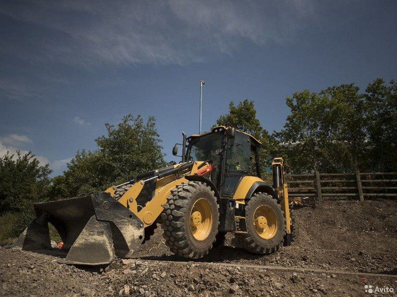 Экскаватор-погрузчик Caterpillar 444
