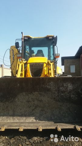 Экскаватор-погрузчик Komatsu WB93R