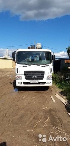 Седельный тягач Hyundai с КМУ