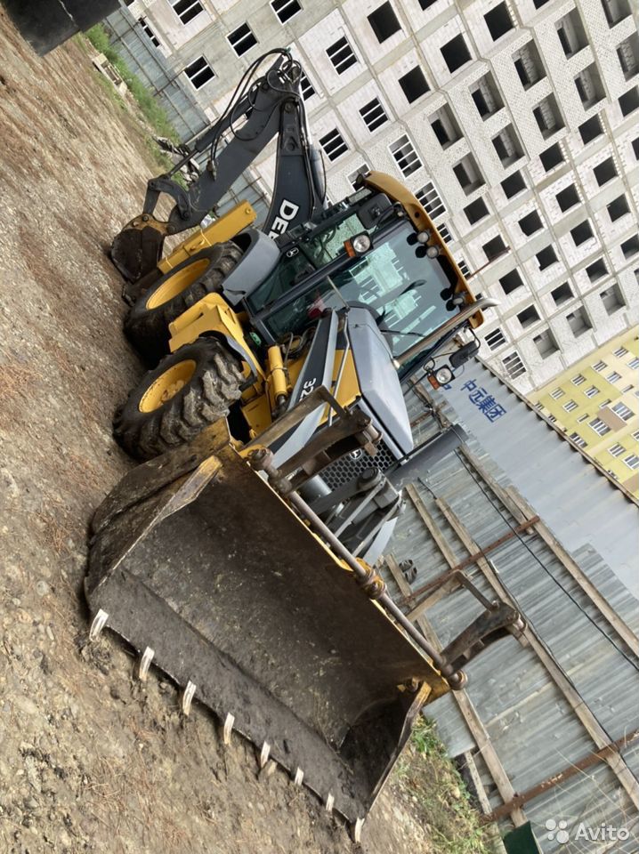 Экскаватор-погрузчик John Deere 325J