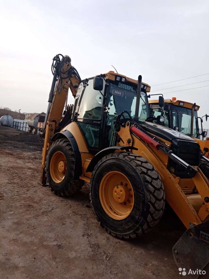 Экскаватор-погрузчик Caterpillar 444E