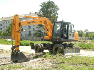 Экскаватор-погрузчик Hyundai R 140LC-7