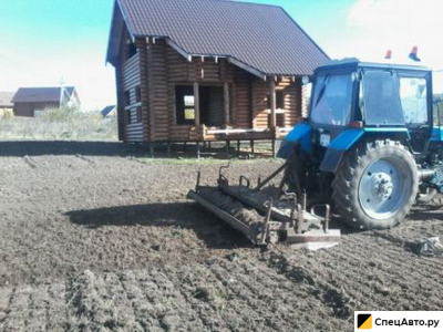 Вспашка земли плугом или фрезой. вывоз мусора