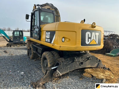 Колесный экскаватор Caterpillar M318D
