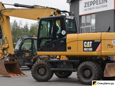 Колесный экскаватор Caterpillar 18M3