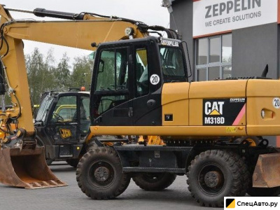 Колесный экскаватор Caterpillar 18M3