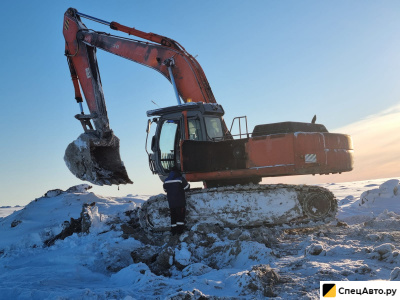 Экскаватор-погрузчик Volvo 250