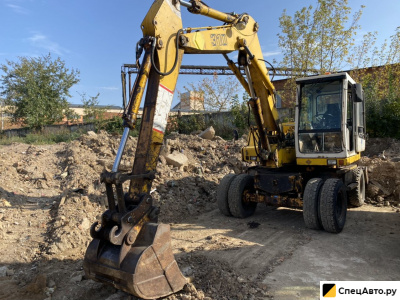 Колесный экскаватор Liebherr 310