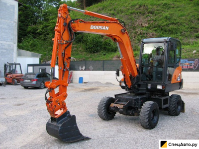 Колесный экскаватор Doosan DX55W