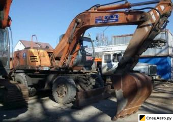 Колесный экскаватор